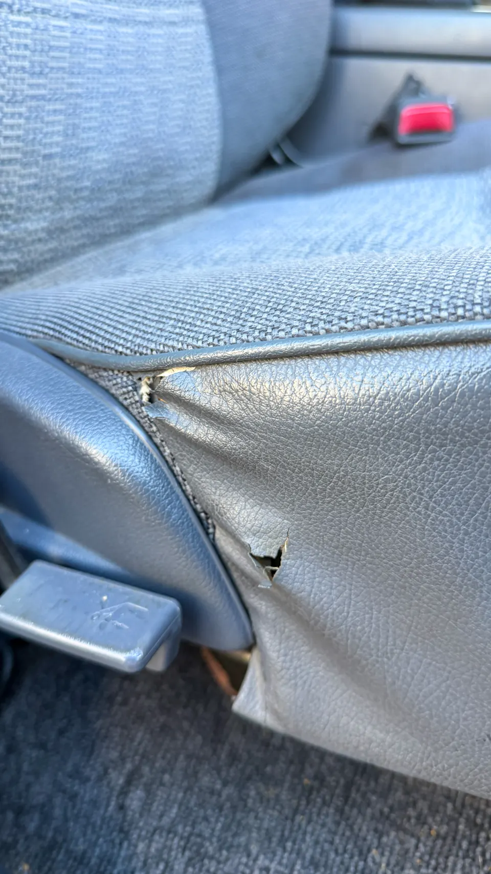 Driver seat bolster tear