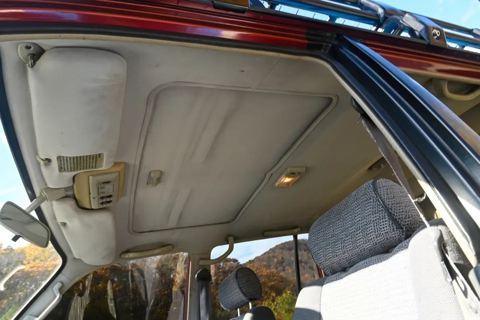 Headliner discoloration around the sunroof opening