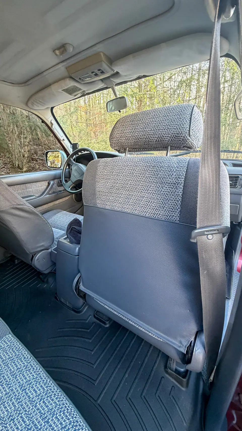 Second row seat back and seat belt